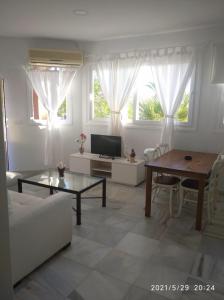 Ruang duduk di Apartamentos Sanlúcar Beach 2 y 3