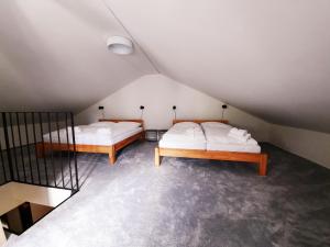 Postel nebo postele na pokoji v ubytování Apartmány Resort Na Horské