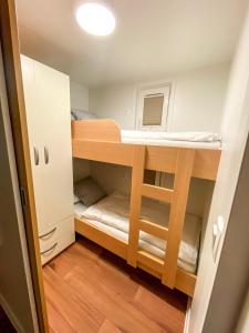 a small room with bunk beds in it at SH Porto 2 Floating House, Marina Portorož in Portorož