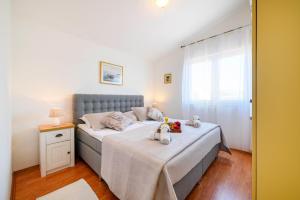 Postel nebo postele na pokoji v ubytování Apartment Bušac