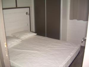 Postel nebo postele na pokoji v ubytování Camping Torraccia