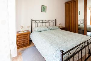 Un pat sau paturi într-o cameră la La Cà Dol Sùl