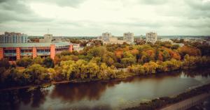 an aerial view of a city with a river at Apart Lux Loft in Sumy +6 photos