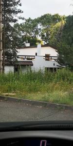 a house sitting on the side of a road at NOCLEGI u ALI in Wałbrzych