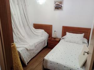 Postel nebo postele na pokoji v ubytování Apartamento playa