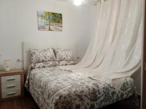 Postel nebo postele na pokoji v ubytování Apartamento playa