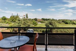Balkón nebo terasa v ubytování Thalassa Apart Hotel