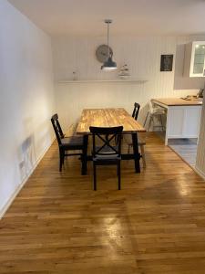 a dining room table and chairs in a kitchen at The Crail Maltings in Crail