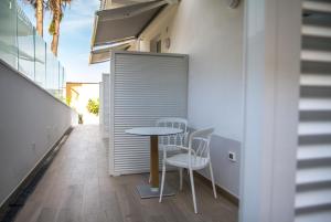 En balkon eller terrasse på Le Bifore