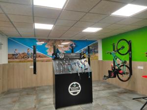 a room with a bike hanging on the wall at Canyelles Platja in Roses