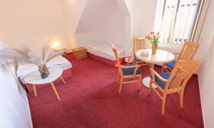 Posezení v ubytování Penzion a restaurace U Červinků + 36 fotografií