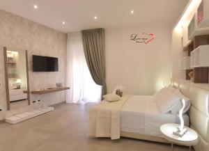 Posteľ alebo postele v izbe v ubytovaní Love inn