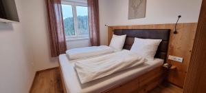 Posteľ alebo postele v izbe v ubytovaní Ferienwohnung Turracherhöhe