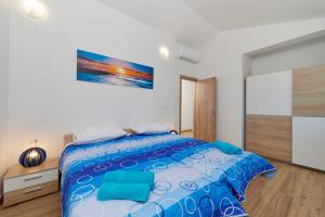 Postel nebo postele na pokoji v ubytování Apartment Olivix