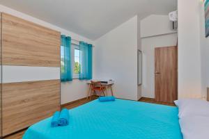Postel nebo postele na pokoji v ubytování Apartment Olivix