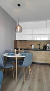 Η κουζίνα ή μικρή κουζίνα στο Apartament Kameleon
