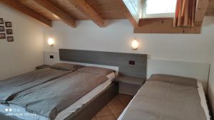 Letto o letti in una camera di Cesa Stefi