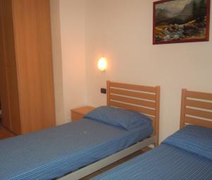 Letto o letti in una camera di Cesa Stefi