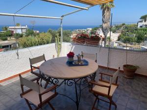 Balkón nebo terasa v ubytování Appartamento turistico Sunset Home