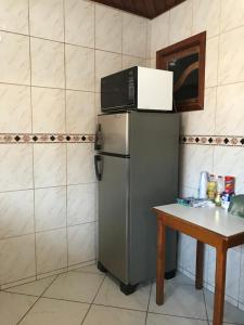 A cozinha ou cozinha compacta de Regi House Hostel