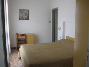 Postel nebo postele na pokoji v ubytování Hotel Eleonora