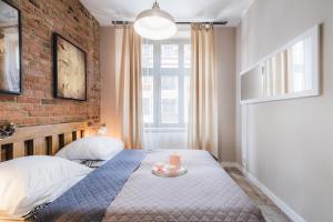 Posteľ alebo postele v izbe v ubytovaní Modern Apartments Toruń 1 Stare Miasto-Centrum