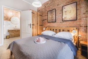 Posteľ alebo postele v izbe v ubytovaní Modern Apartments Toruń 1 Stare Miasto-Centrum