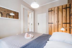 Posteľ alebo postele v izbe v ubytovaní Modern Apartments Toruń 1 Stare Miasto-Centrum