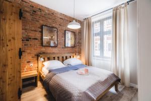 Posteľ alebo postele v izbe v ubytovaní Modern Apartments Toruń 1 Stare Miasto-Centrum