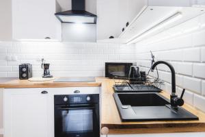 Kuchyňa alebo kuchynka v ubytovaní Modern Apartments Toruń 1 Stare Miasto-Centrum