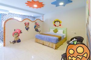 Ένα ή περισσότερα κρεβάτια σε δωμάτιο στο Mu Yu B&B
