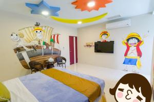 Ένα ή περισσότερα κρεβάτια σε δωμάτιο στο Mu Yu B&B