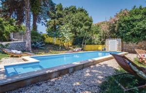 Bazén v ubytování Holiday home in Mali Lošinj with Pool, Whirpool, Terrace, Air conditioning, Wi-Fi, Washing machine 4780-1 nebo v jeho okolí