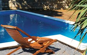 Bazén v ubytování Holiday home in Mali Lošinj with Pool, Whirpool, Terrace, Air conditioning, Wi-Fi, Washing machine 4780-1 nebo v jeho okolí