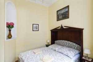 Ένα ή περισσότερα κρεβάτια σε δωμάτιο στο Pension Napoleon
