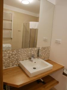 Ένα μπάνιο στο Apartament Mondi Kai I - idealny na pobyt w górach +29 φωτογραφίες