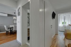 TV a/nebo společenská místnost v ubytování Apartments Piano