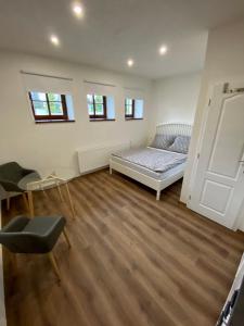 Voodi või voodid majutusasutuse Apartmány V uličce Frymburk toas
