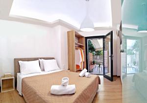 Posteľ alebo postele v izbe v ubytovaní apus apartments