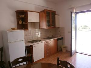 Kuchyň nebo kuchyňský kout v ubytování Apartments Gorenjka