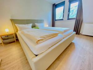 Postel nebo postele na pokoji v ubytování Pension / Ferienwohnungen Scheid