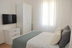 Posteľ alebo postele v izbe v ubytovaní Verdi Due