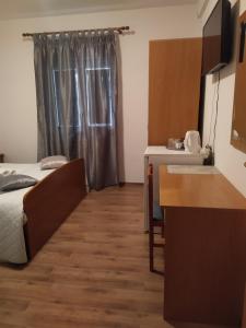 Postel nebo postele na pokoji v ubytování Krka Ivan