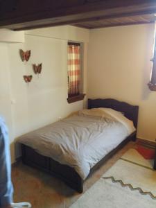 Posteľ alebo postele v izbe v ubytovaní La Casa di Pietra