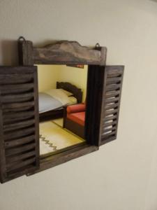 Posteľ alebo postele v izbe v ubytovaní La Casa di Pietra