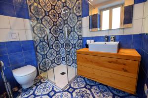 Ett badrum på Antica Residenza Amalfitana