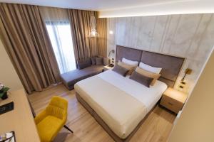 Postel nebo postele na pokoji v ubytování Gloria Palace Hotel & SPA