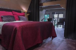 Postel nebo postele na pokoji v ubytování Hotel Sebastians
