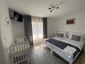 Posteľ alebo postele v izbe v ubytovaní Bolkovac Apartman Ulica Donje selo 33 Fužine