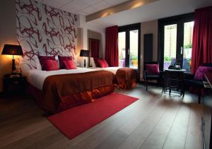 Postel nebo postele na pokoji v ubytování Hotel Sebastians + 37 fotografií